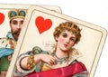 A close up of vintage queen and king of hearts playing cards.. Royalty Free Stock Photo