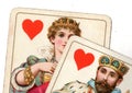 Close up of a vintage queen and king of hearts playing cards. Royalty Free Stock Photo