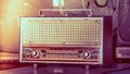 Close up of vintage radio buttons and tuner control panel. Wooden brown antique retro old radio scale. Royalty Free Stock Photo