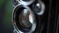 Macro close-up of a vintage retro Rolleiflex TLR film camera lens details.