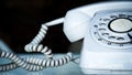 Close up of vintage rotary telephone on table. Vintage rotary landline telephone or wire telephone for contact us concept. Royalty Free Stock Photo