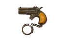 Close-up the vintage toy gun keychain Royalty Free Stock Photo