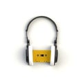 Close up of vintage yellow audio tape cassette with headset concept illustration on white background, Top view with copy space Royalty Free Stock Photo