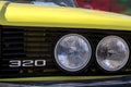 Close up of vintage yellow BMW 320 car light Royalty Free Stock Photo