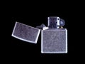 Close up vintage zippo lighter isolated on black Royalty Free Stock Photo