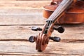 Close up violin on old wooden surface. Royalty Free Stock Photo