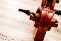 Close Up of Violin Scroll and Bow Royalty Free Stock Photo