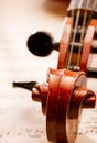 Close Up of Violin Scroll and Bow Royalty Free Stock Photo