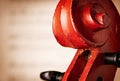 Close Up of Violin Scroll in front of Sheet Music Royalty Free Stock Photo