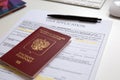 Close up of a visa application document with a Russian passport Royalty Free Stock Photo