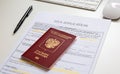 Close up of a visa application document with a Russian passport Royalty Free Stock Photo