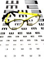 Glasses on vision test chart