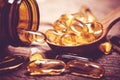 Close up the vitamin D and Omega 3 fish oil capsules supplement Royalty Free Stock Photo