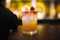 Close-up of a vivid cocktail with fresh fruits