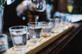 Close up on Vodka shots and other alcohols in a row Royalty Free Stock Photo