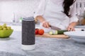 Close-up Of Voice Assistant Speaker On Kitchen Counter