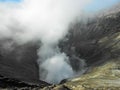 Close up of volcano crater spewing smoke at Mount Bromo Royalty Free Stock Photo