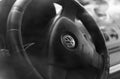 Close-up of the Volkswagen car logo on the steering wheel. Royalty Free Stock Photo