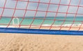 Close up on a volley ball net on a sandy beach Royalty Free Stock Photo