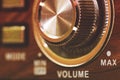 Close up of volume control button on vintage radio Royalty Free Stock Photo