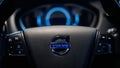 Close up Volvo logo on the steering wheel. Volvo V40 dashboard interior. Royalty Free Stock Photo