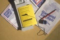 Close-up of a voting booth with ballots, ballot machine and election pamphlets, CA Royalty Free Stock Photo