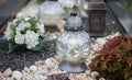 Close up of Votive candles lantern on the grave in Slovak Catholic cemetery during day. Autumn scene. All Hallows eve. Memorial Royalty Free Stock Photo