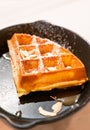 Close up waffle with caramel sauce and almond