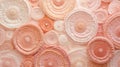 A close up of a wall covered in pink and white circles, peach fuzz, trendy color of the year 2024.