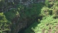 Close up of the wall of a sink hole on isla santa cruz in the galapagos