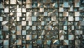 A close-up of a wall made of many small, square, metallic tiles with a reflective surface. The tiles are arranged in a Royalty Free Stock Photo