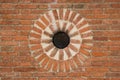 Close up of a wall made of orange bricks