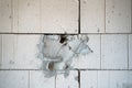 Close-up wall made of white aerated concrete block. Bricklayer mistake when bricking the wall of the house. The hole from the Royalty Free Stock Photo