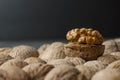 Close up walnut kernel with shell on wooden backdrop. healthy food for brain. walnut background Royalty Free Stock Photo