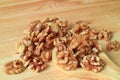 Close-up of Walnuts Scattered from Wooden Spoon on the Wooden Table, Selective Focus