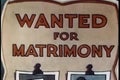 Close-up wanted for matrimony sign