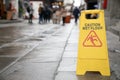 close up of warning sign for caution wet floor Royalty Free Stock Photo