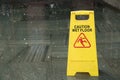 Warning sign for wet floor, caution and dangerous