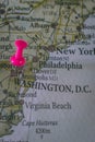 Close up of Washington D.C. pin pointed on the world map with a pink pushpin Royalty Free Stock Photo