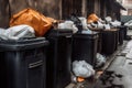 close-up of waste disposal site, with overflowing bins and trash bags Royalty Free Stock Photo