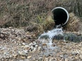 Close Up Of Waste Pipe Discharging Liquid Onto Beach Royalty Free Stock Photo