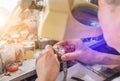 Close up watchmaker repairing mechanism old watch Royalty Free Stock Photo