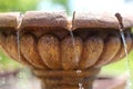 Close up of Water Dripping from Garden Fountain Royalty Free Stock Photo