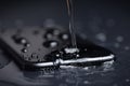 Close-up water drop on phone device waterproof concept Royalty Free Stock Photo