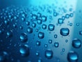 Close Up Water Droplets Floating In Blue Light Reflective Surface Royalty Free Stock Photo