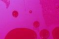 Close up of water drops on dark red tone background. Abstract red wet texture with bubbles on plastic PVC surface or grunge. Royalty Free Stock Photo