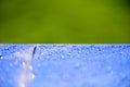 Close up Water drops pattern over a blue waterproof cloth Royalty Free Stock Photo