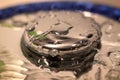 Close up of water drops on shiny metal surface Royalty Free Stock Photo