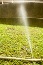 Close up Water hose has sprung a leak when watering Royalty Free Stock Photo