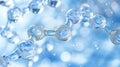 Close-Up of Water Molecule Chain with Blue Bokeh Background Royalty Free Stock Photo